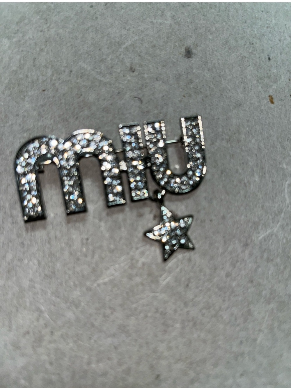 MIU Crystal Letter Brooch with Star Accent - Silver